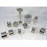 Two pairs of hallmarked silver napkin rings; a hallmarked silver specimen vase; other small items of