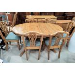 A modern pine dining suite comprising twin pedestal extending table, 6 chairs and sideboard of 3