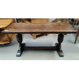An oak refectory style bench/coffee table on round bulbous legs.