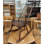 An Ercol style stick back rocking chair