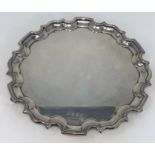 A Scottish hallmarked silver Salver with pie crust border on 3 raised feet. Edinburgh 1994 (12.8oz)