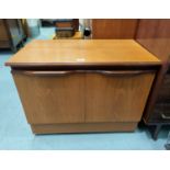 a teak two door cupboard/record cabinet