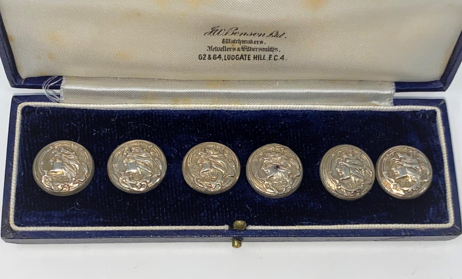 A cased set of 6 hallmarked silver buttons with embossed portrait decoration, Chester - date