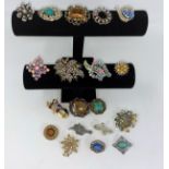 A selection of costume brooches and jewellery etc