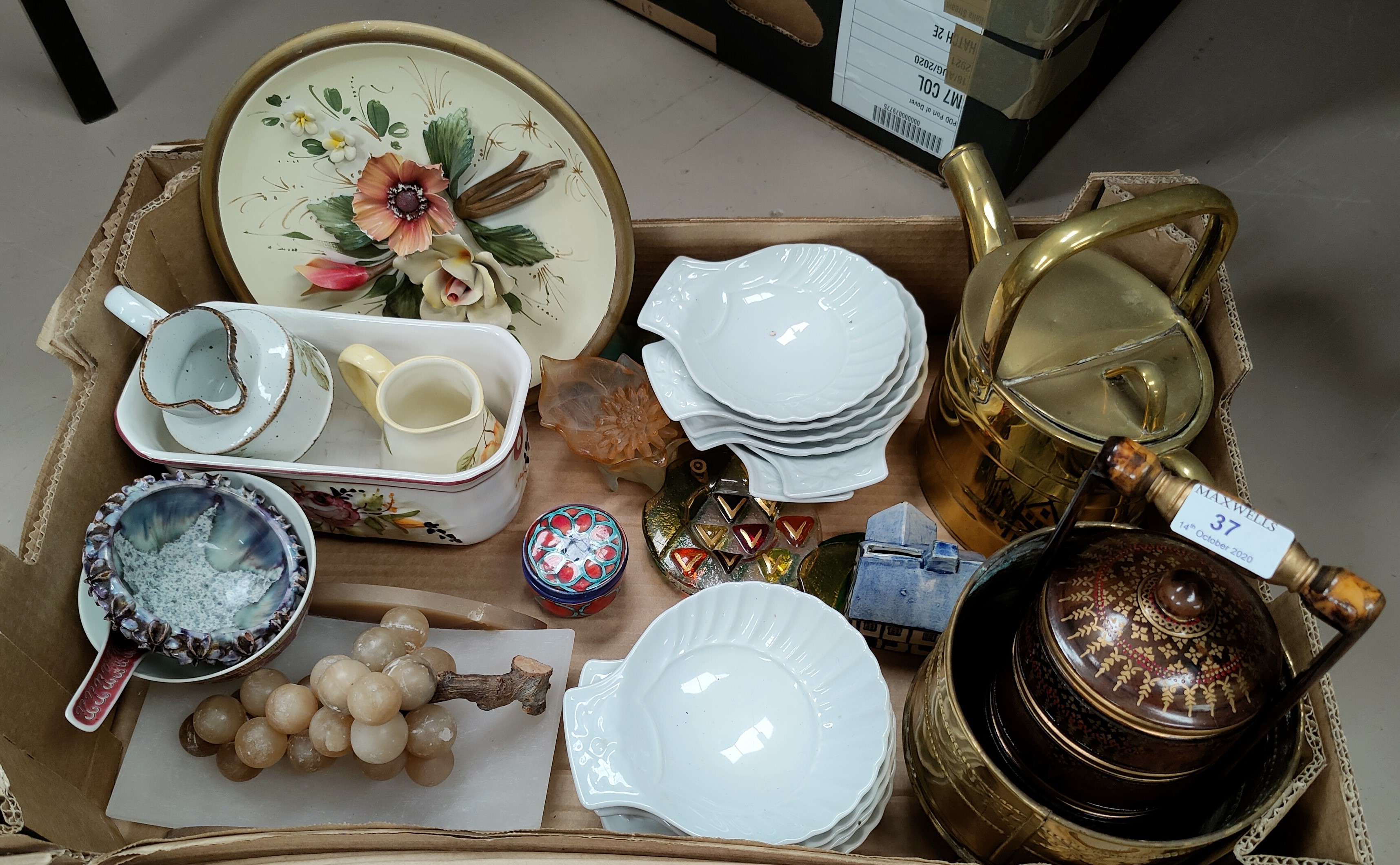 A laquer effect miniature Japanese stacking picnic set. A selection of French shell dishes; brass