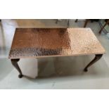 A copper top coffee table; a circular walnut occasional table and a stool.