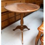 A Danish teak tripod occasional table, top 60cm diameter