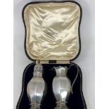 A hallmarked silver strawberry set comprising octagonal cream jug and sugar sifter, London 1908, 8