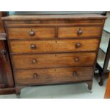 A Georgian crossbanded oak chest of 3 long and 2 short drawers