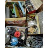 A quantity of fishing equipment to include 2 trout reels and a good selection of lures