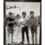 THE BEATLES 10 x 8" black & white photograph signed by all four, three in blue ink & Paul in black