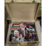 A suitcase containing movie & other similar magazines