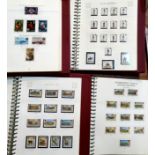 Channel Islands and Isle of Man a collection of stamps in 4 Stanley Gibbons albums