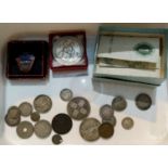 A £1 note & a selection of pre-decimal silver & other coins