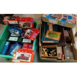 A selection of vintage games and a selection of diecast cars