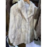 A lady's pale blonde 3/4 length mink jacket (L); a full length vintage brown fur coat