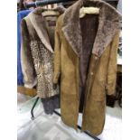 A lady's full length brown sheepskin coat by Morlands (M); a 3/4 length fur coat with leopard tpe