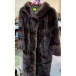 A good quality lady's ballerina style 1960's / 70's brown ranch mink coat formed from horizontal