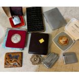 A selection of vintage cigarette lighters etc