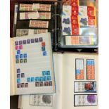 A collection of GB stamp booklets and booklet sheets in albums
