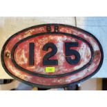 An oval cast metal sign for British Rail 125
