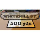 A cast iron sign "Whitehill Street"; a railway sign "500 yards"