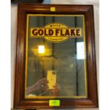 An early 20th century Gold Flake cigarette advertising mirror in stained wooden frame 34 x 24cm