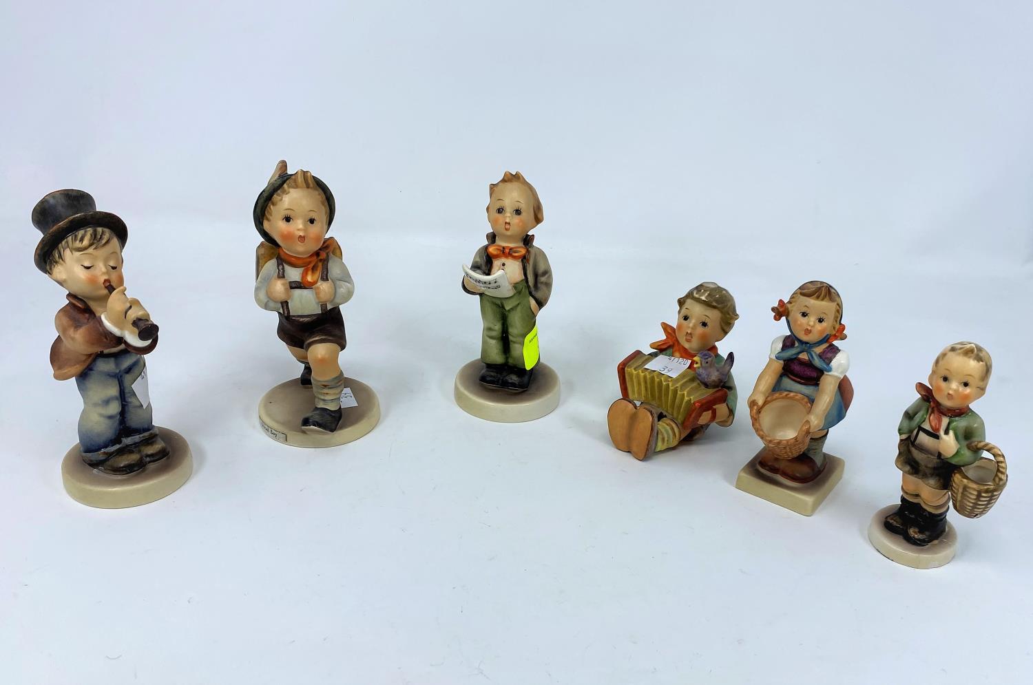 Six Goebel Hummel figures, "Little Helpers" etc