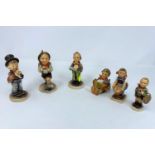 Six Goebel Hummel figures, "Little Helpers" etc