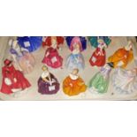 A collection of 10 Royal Doulton small female figures