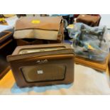 A 1960's Robert's radio; a vintage travelling sewing machine