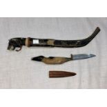 A mid 20th Century Norwegian/Icelandic hunting knife in stained bone case with animal head