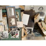 A collection of vintage photographs including a Victorian photo-album