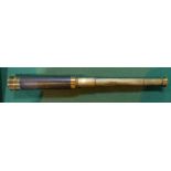 A leather covered brass 3 draw telescope with lens cover c 19