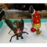 An early German tinplate clockwork beetle by Lemmann and a wind up tinplate clown