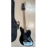 A Fender Squires "Jaguar" electric bass guitar with gig bag s/n ICS12255767