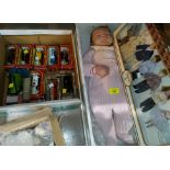 An originally boxed Ashton-Drake baby doll; an originally boxed set of 8 Alberon miniature dolls;