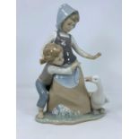 A Lladro group girl with boy & goose 27cm