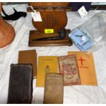 An oak pipe rack, various RAF badges, 6 service issue bibles
