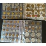 A collection of 350 coins and tokens in 2 albums