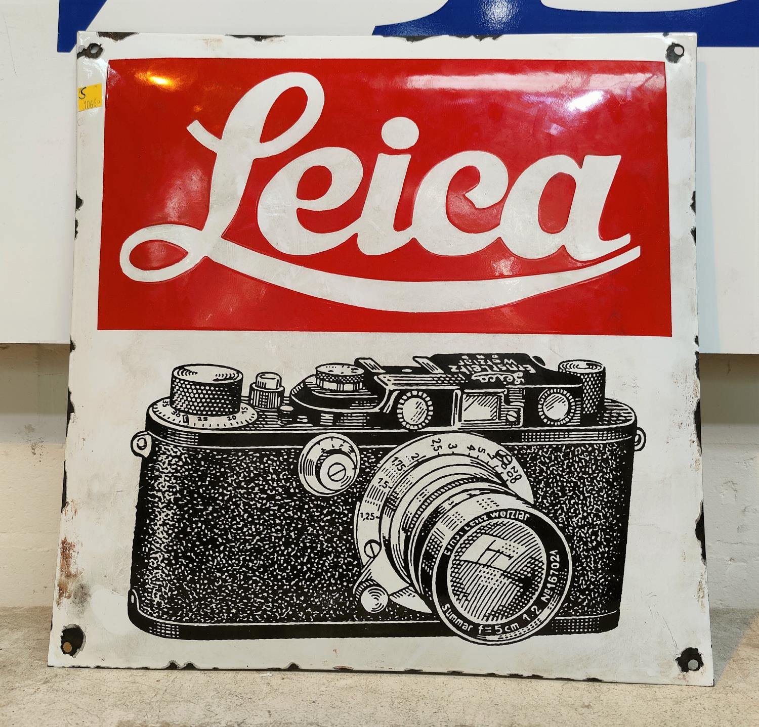 A Leica enamel tin plate sign 40 x 40cm and a no parking sign