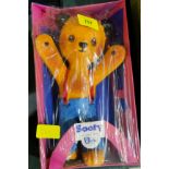 BENDY TOYS - an originally boxed Sooty; a vintage cased Singer sewing machine