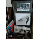 A collection of Elvis related books, 20 approx; a facsimile signature and concert ticket for Michael