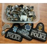 A selection of around 100 Police badges and buttons etc