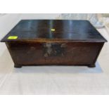 An antique oak locked box carved "JW 1754" to the front
