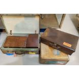 A selection of vintage cases etc