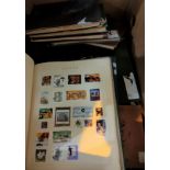 A selection of world stamps in albums and stockbooks