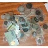 A selection of Great Britain and world coins, some with silver content including 2 silver dollars (