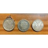 Three American silver dollars: 1879, 1883 & 1889