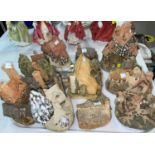 A collection of David Winter miniature cottages etc